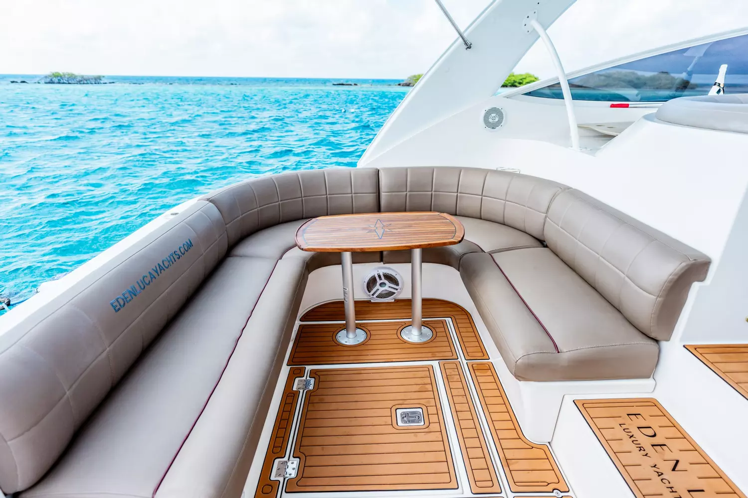 Spacious outdoor seating area aboard a 47-foot private luxury yacht charter in Aruba