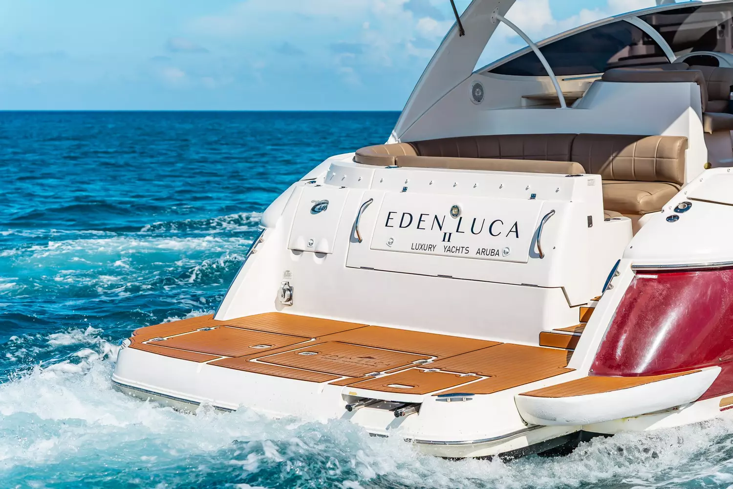 Rear swim platform of a 47-foot luxury private yacht cruising in Aruba